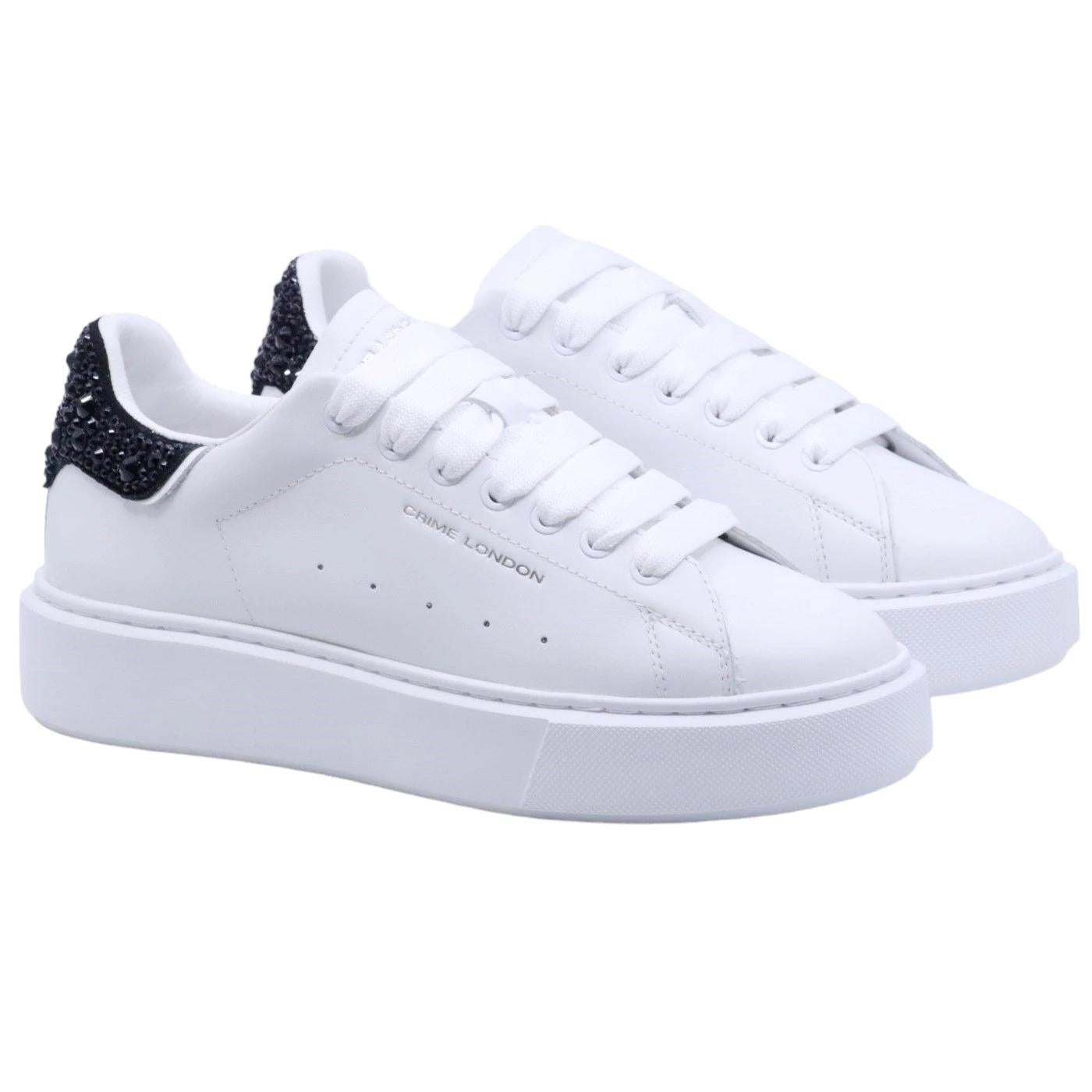 Sneaker donna Crime London in morbida pelle bianca con talloncino in glitter nero 