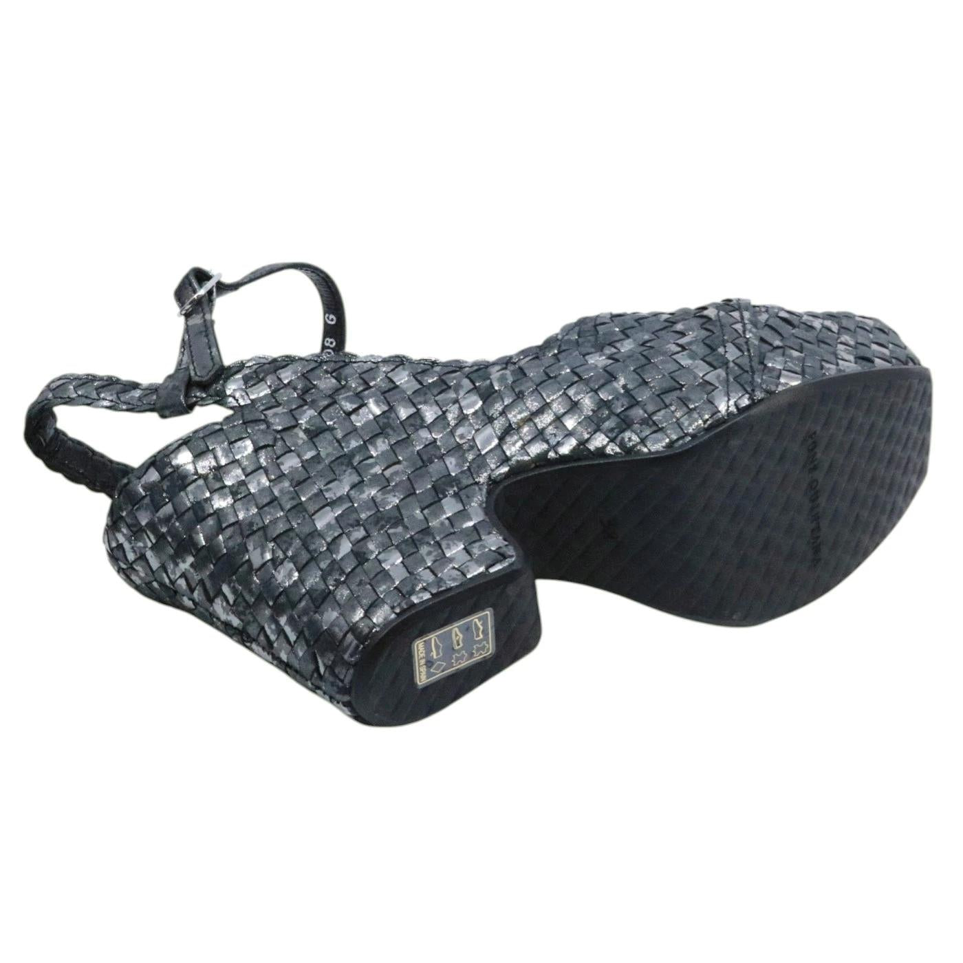 Pons Quintana Cali 11360 G09 sandalo donna in pelle intrecciata nera con plateau elegante 